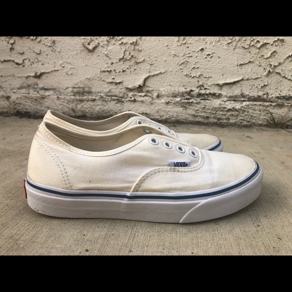 cream vans with blue stripe